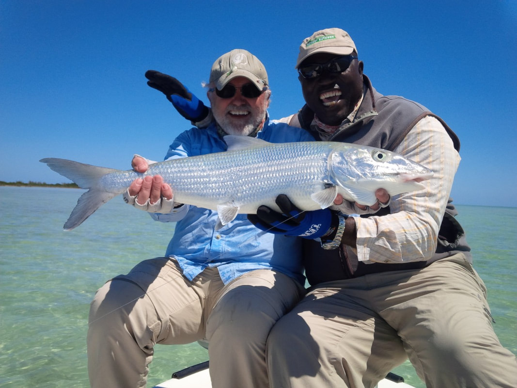 Charlie Neymour and client with huge bonefish